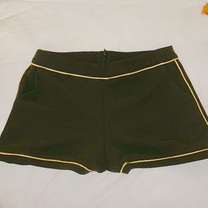Gold lining and black Spain shorts